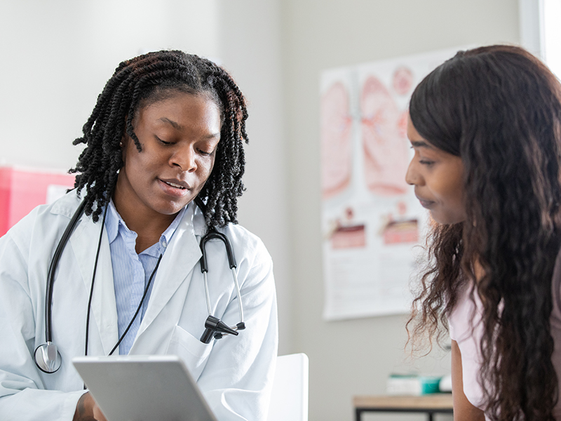 Doctor talking with patient